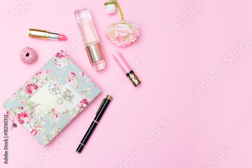 Women's cosmetics and accessories on a pink background. Mock up