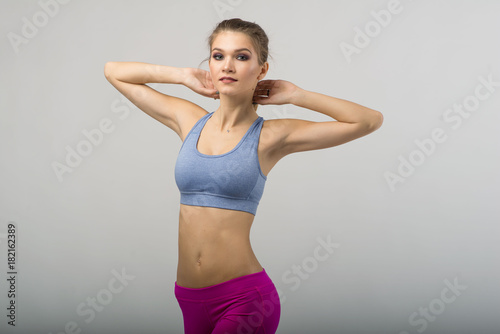 Sport fitness woman on the isolated over white background.
