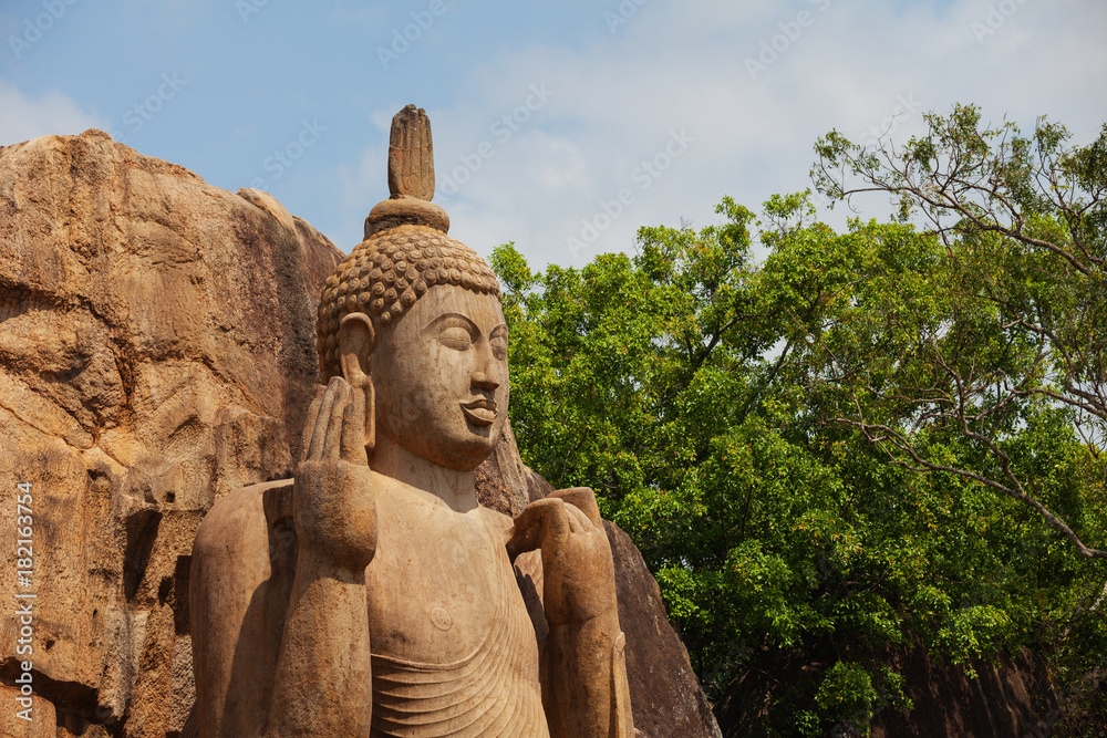 Avukana statue is a standing statue of the Buddha. Sri Lanka. Horizontal shot