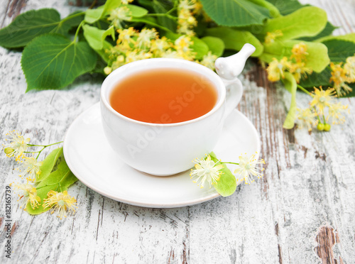 cup of herbal tea with linden flowers