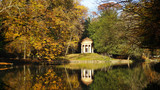 Beautiful autumn landscape with reflection in water pond