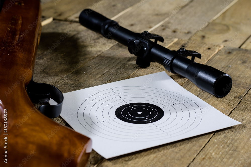 shooting, pneumatic and firearms on a wooden table. Table on the shooting range, weapons and shooting accessories.