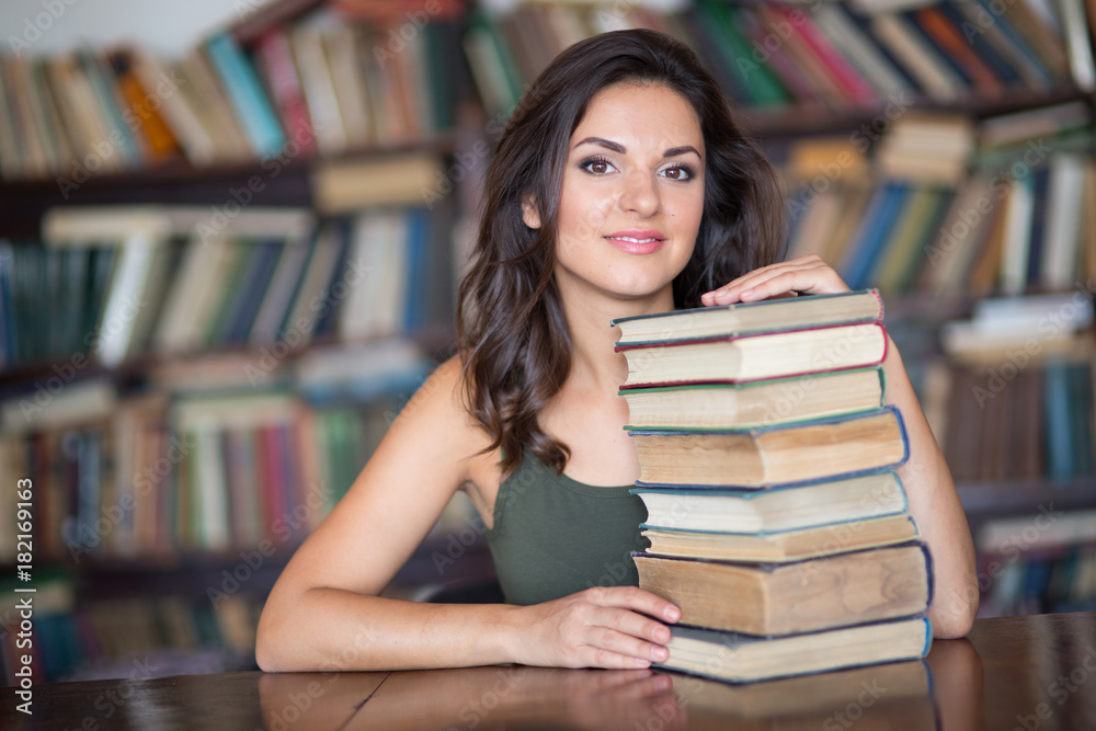 Beautiful female in the library Beautiful female in the library