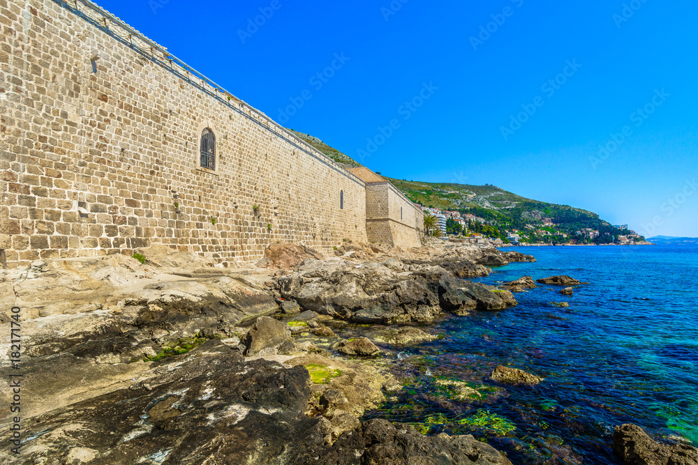 Obraz premium Lazareti building Dubrovnik coastline. / Coastal view at historical site in Dubrovnik, famous quarantine for plaque disease in Europe, Croatia.