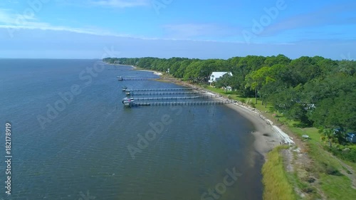 Aerial waterfront homes in Carrabelle FL Gulf of Mexico 4k 60p photo