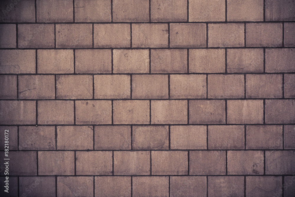 Fotografie High resolution brown cream brick wall texture
