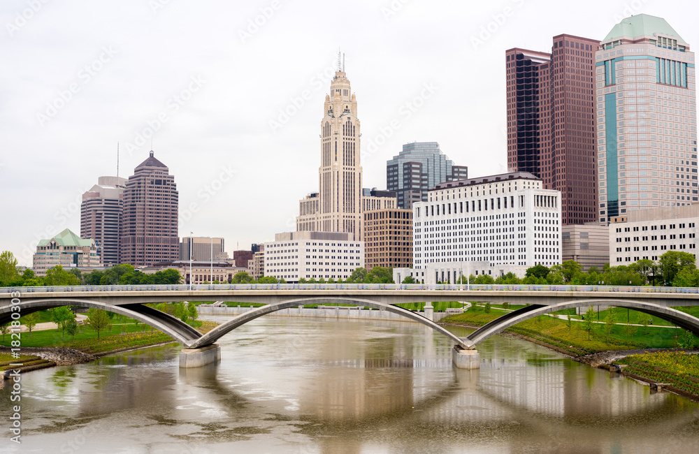 Close up of some of the Columbus Ohio skyline with river and bridge
