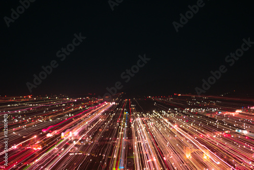 light lines with long exposure,  speed motion abstract background in the dark night ,  blast zoom effect , zoom burst of light in the city
