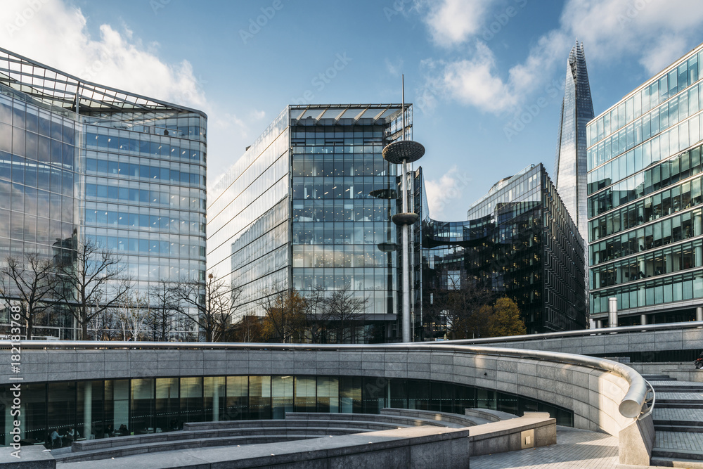 Modern glass buildings, including the Shard on South side of London, UK Modern glass buildings, including the Shard on South side of London, UK