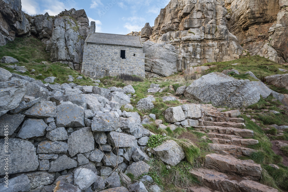 Stunning landscape image of St Govan's Chapel on Pemnrokeshire Coast in Wales