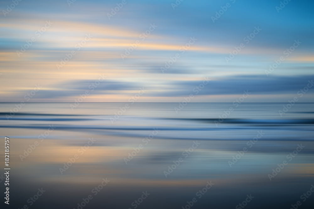Beautiful long exposure blur sunrise landsdcape of idyllic Broadhaven Bay beach on Pembrokeshire Coast in Wales
