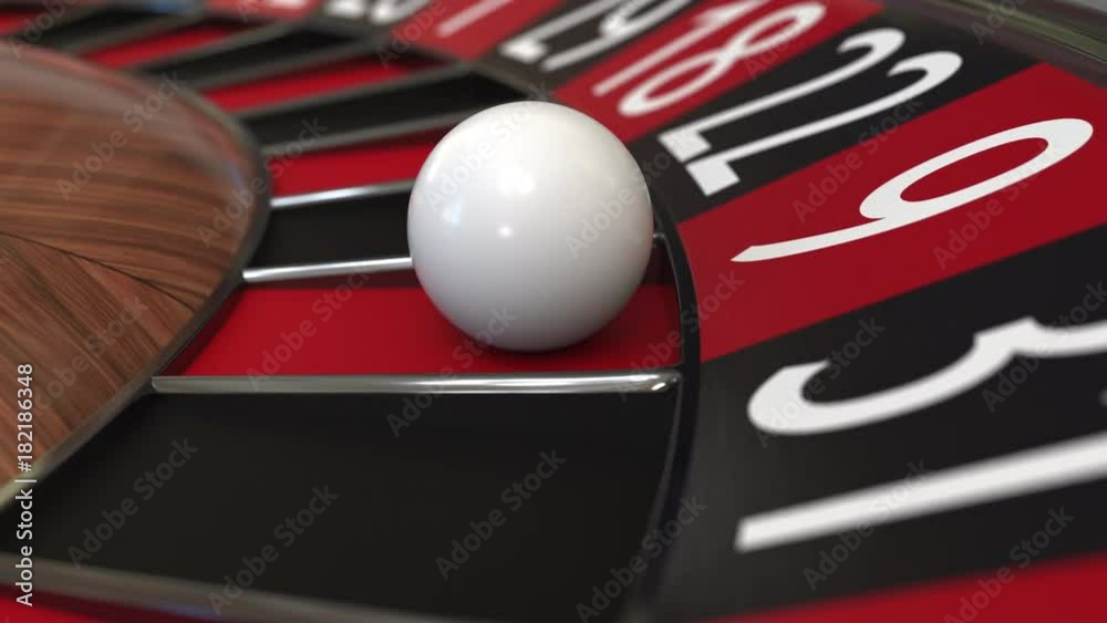 Casino roulette wheel ball hits 9 nine red