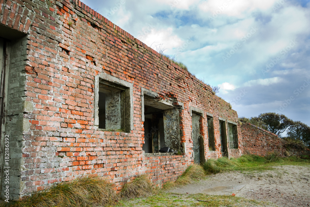 Remainders of an old German bunker, part of the Atlantikwall, in the dunes of the dutch island Terschelling Remainders of an old German bunker, part of the Atlantikwall, in the dunes of the dutch island Terschelling