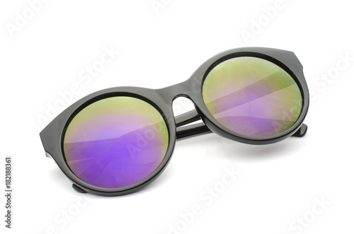 Round sunglasses in black frame with purple glasses isolated on white