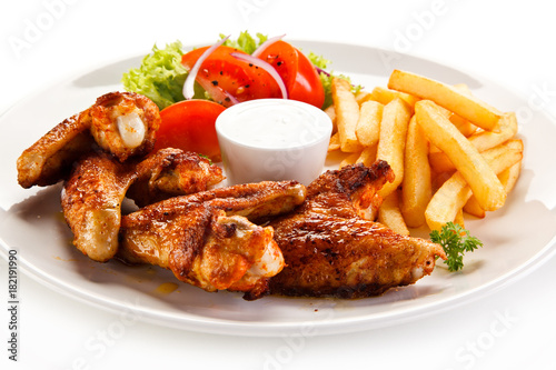 Fried chicken wings with french fries 