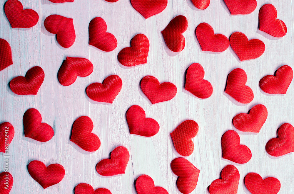 Red hearts on a textured background. Red hearts on a textured background.