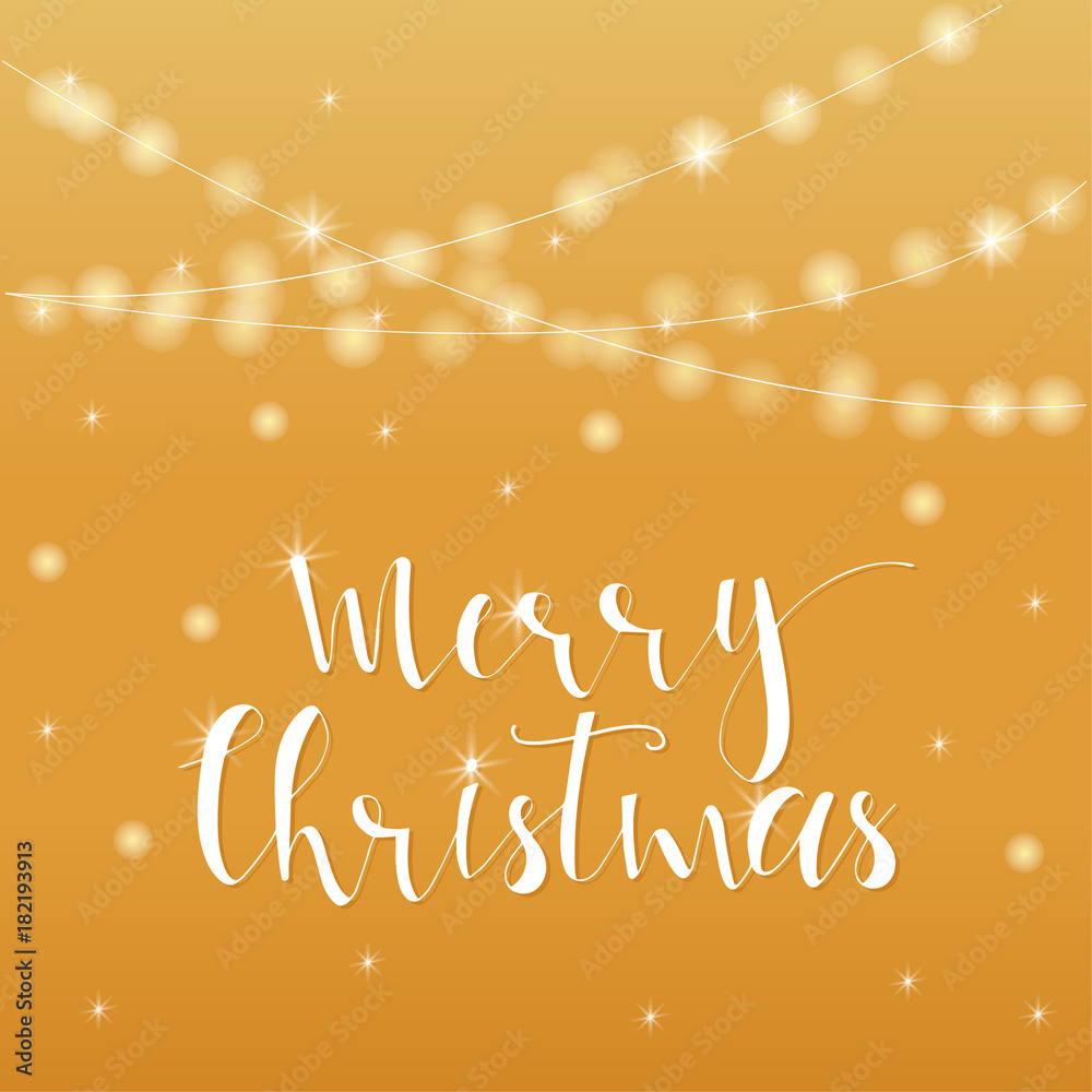 Fototapeta premium Wonderful and unique festive golden luminous background with Christmas wishes for holiday greeting cards. Hand drawn lettering with blurred bokeh.
