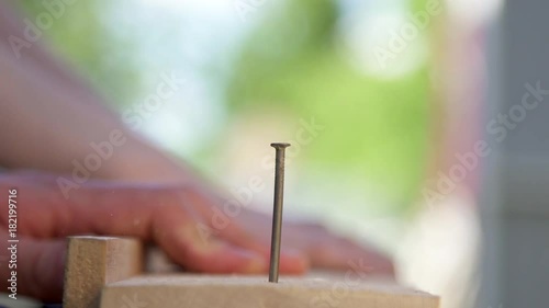 Hammer hitting a nail