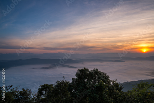 Fototapeta Naklejka Na Ścianę i Meble -  Dawn of Sea Mist on the top of Sierra, Doi Samer-Dao, Nan, Northern of Thailand