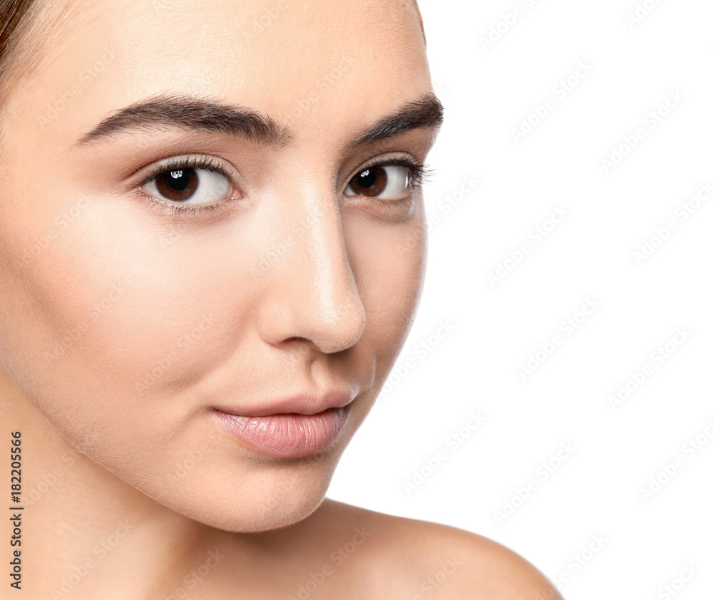 Portrait of beautiful young woman before applying eyelash extensions, on white background