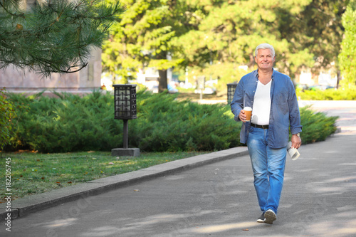 Handsome mature man walking...