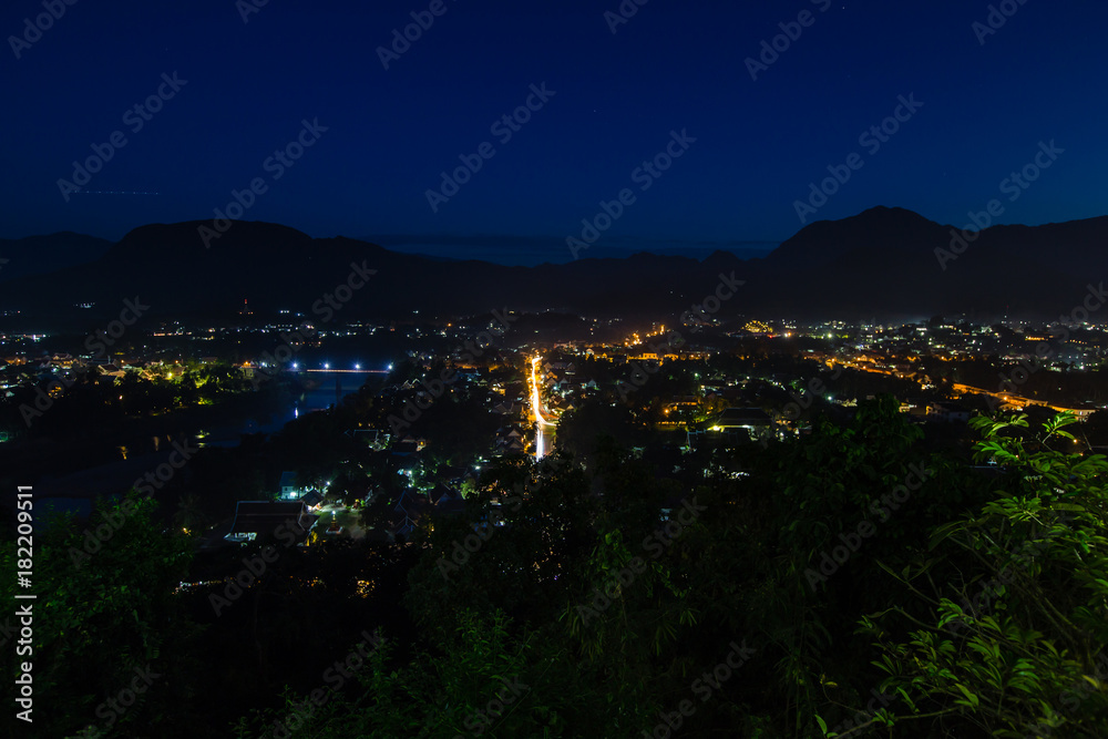 night scene of cityscape from viewpoint at Mount Phousi