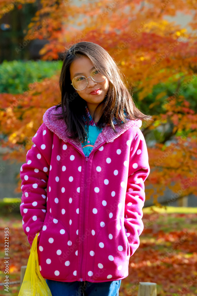Portrait of young beautiful girl with maple leaf Portrait of young beautiful girl with maple leaf