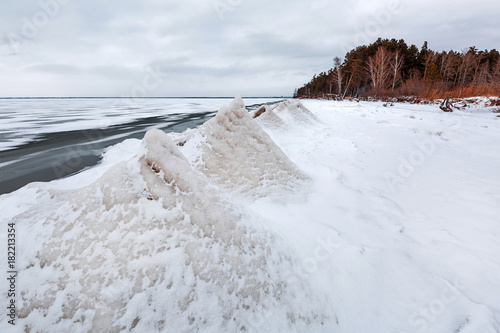 Ice pyramid on the river. The Ob River, Siberia