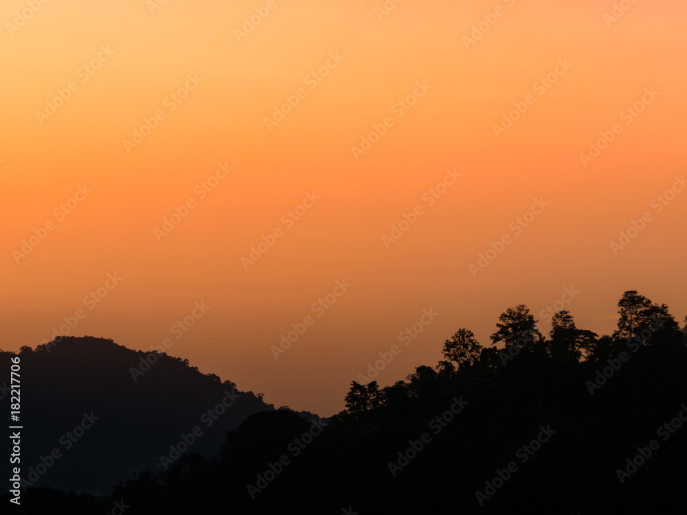 the beautiful  sky with cloudy background and silhouette mountain in twilight time.