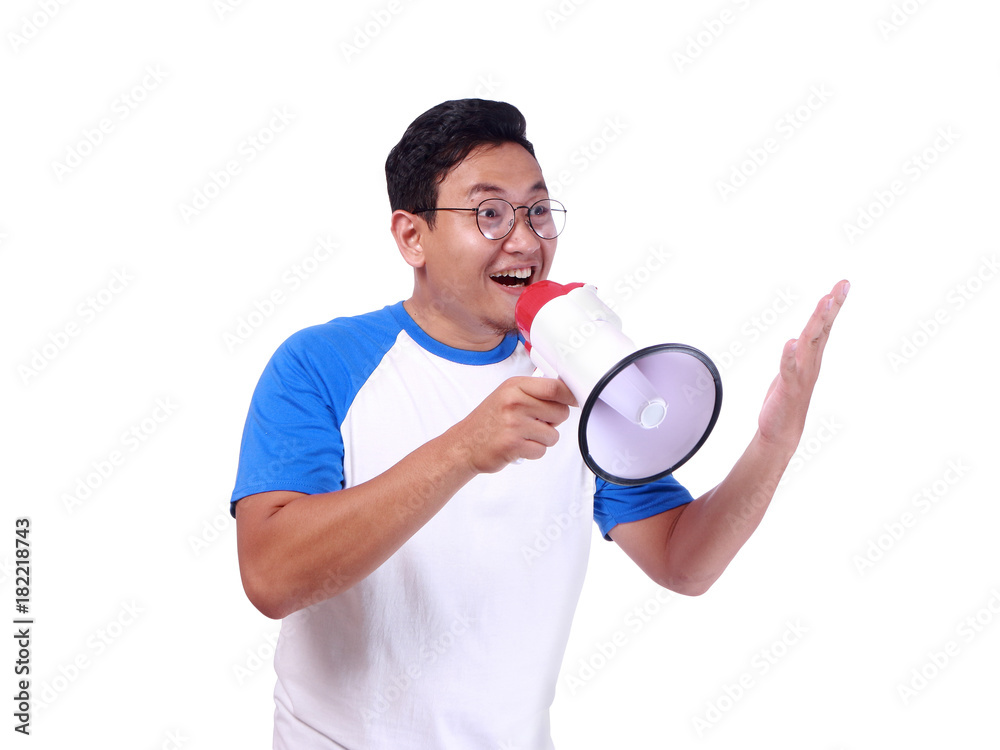 Young Man Shouting with Megaphone, Promotion Concept Young Man Shouting with Megaphone, Promotion Concept