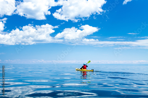 A man in a sea kayak on Lake Baikal