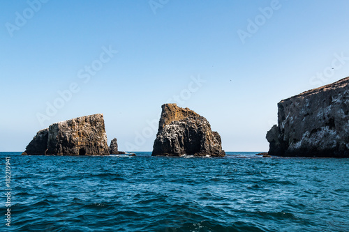 A grouping of volcanic rock formations at East Anacapa Island in Channel Islands National Park off the coast of Ventura, California. photo