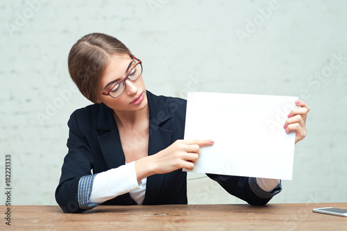 Business woman show white paper