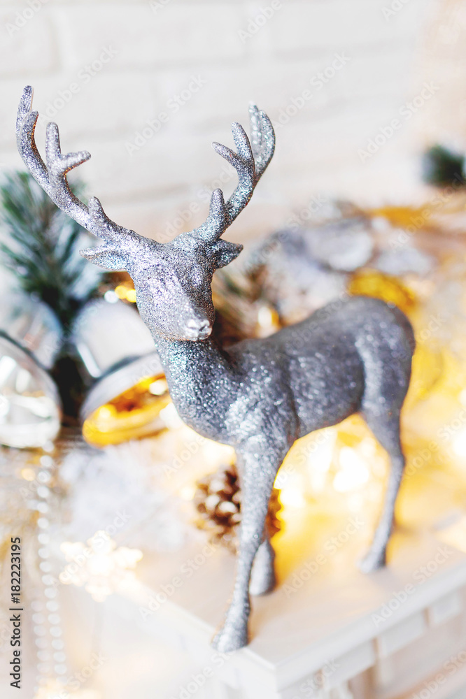 Christmas and New Year decorations with silver deer. Holiday winter background. Christmas and New Year decorations with silver deer. Holiday winter background.