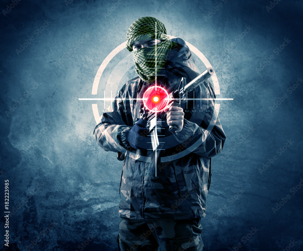 Masked terrorist man with gun and laser target on his body