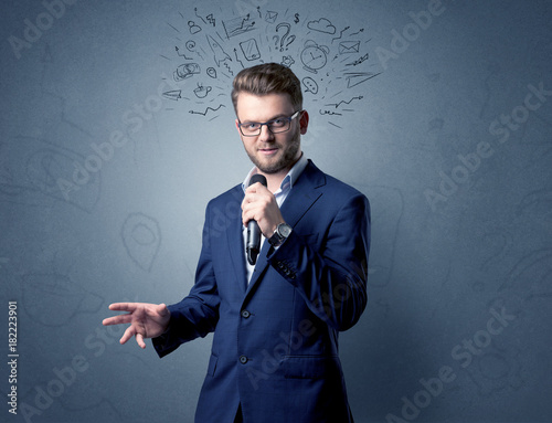 Businessman holding microphone