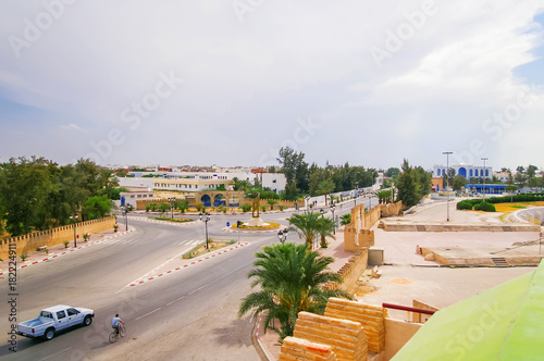 Fototapeta Naklejka Na Ścianę i Meble -  Suburbs of  Kairouan city, Tunisia. Panorama view of crossroads from above.