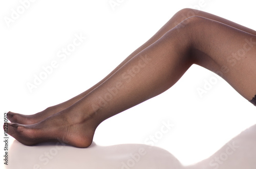 Female legs black stockings tights