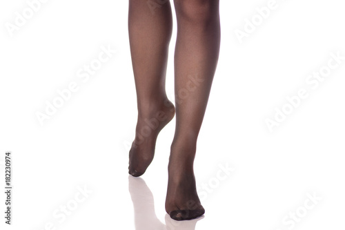 Female legs black stockings tights