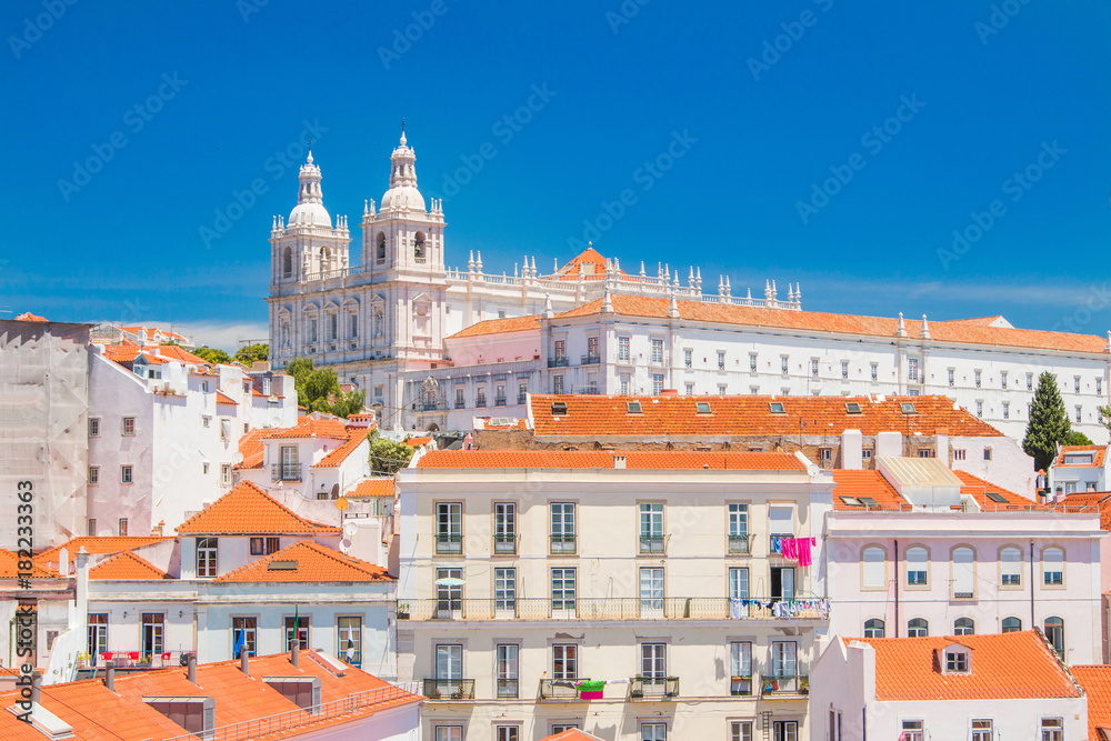      Aerial scenic view of central Lisbon Portugal with red tile roofs and monastery Igreja Sao Vicente de Fora 