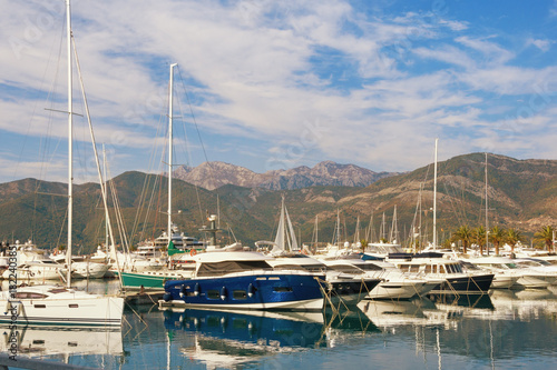 View of Porto Montenegro - luxury yacht marina in the Adriatic - on a calm autumn day. Tivat, Montenegro