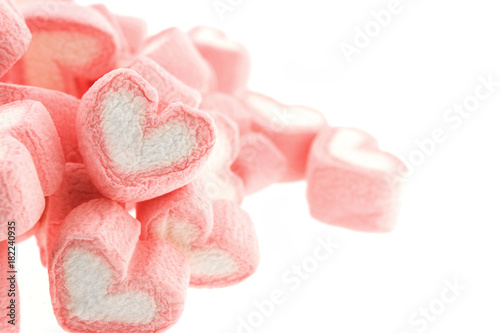 Pink heart shaped marshmallows isolated