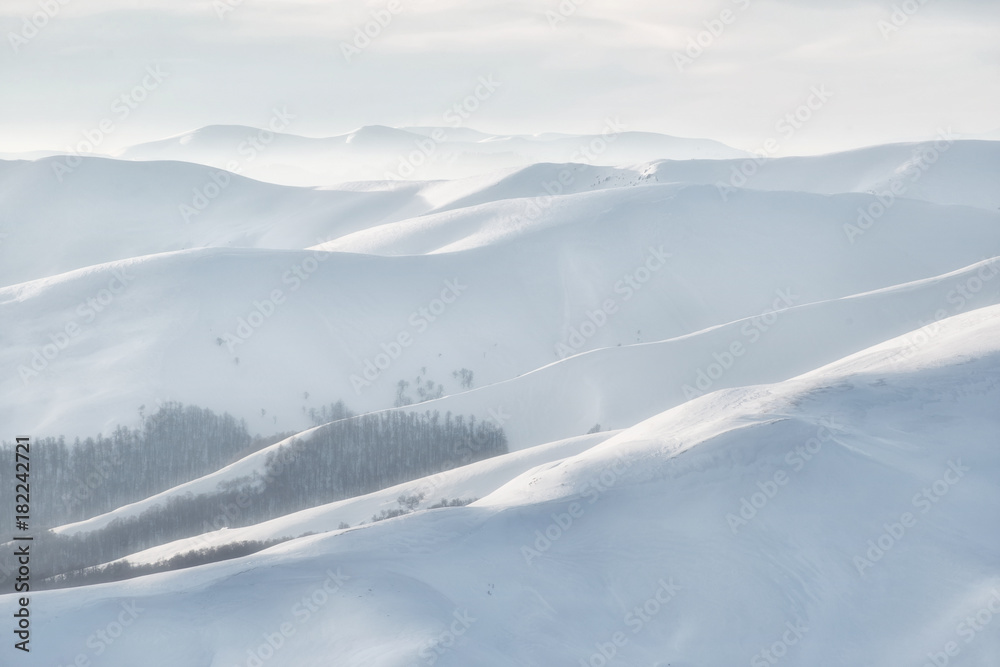 Mountain in the winter time during sunset. Natural landscape in the winter time