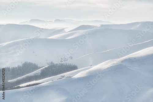 Mountain in the winter time during sunset. Natural landscape in the winter time © biletskiyevgeniy.com