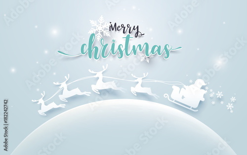Santa Claus in a Sledge and Reindeer on moon with Merry Christmas text on soft blue background. Paper art and craft Style © pickup
