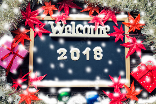 Happy New Year 2018 on backboard with snowfall banner background © Aunging