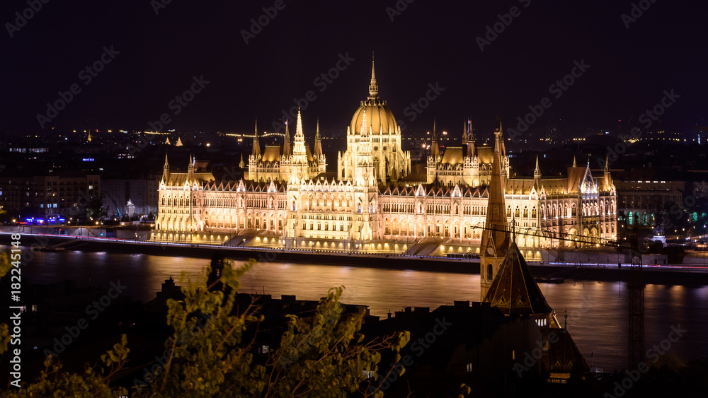 Night view of the hungarian parliament in Budapest, Hungary.