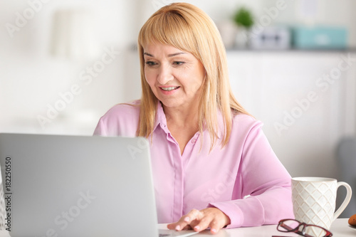 Beautiful mature woman work...