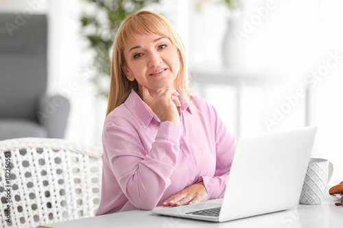 Beautiful mature woman work...