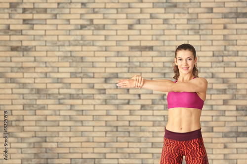 Sporty young woman training...